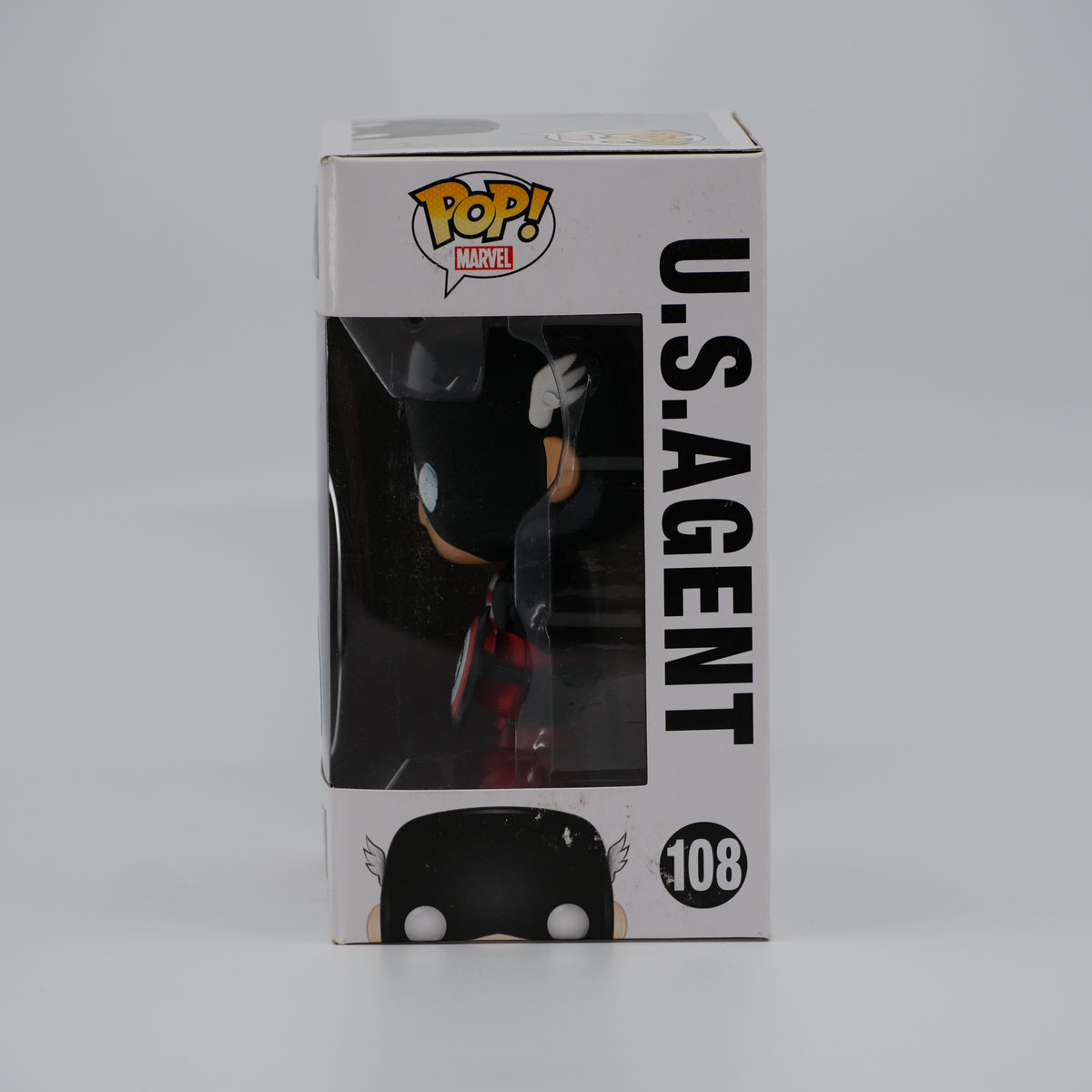 Funko Pop! U.S. Agent #108 - Marvel | Comikaze exclusive - window side of the exact boxed item
