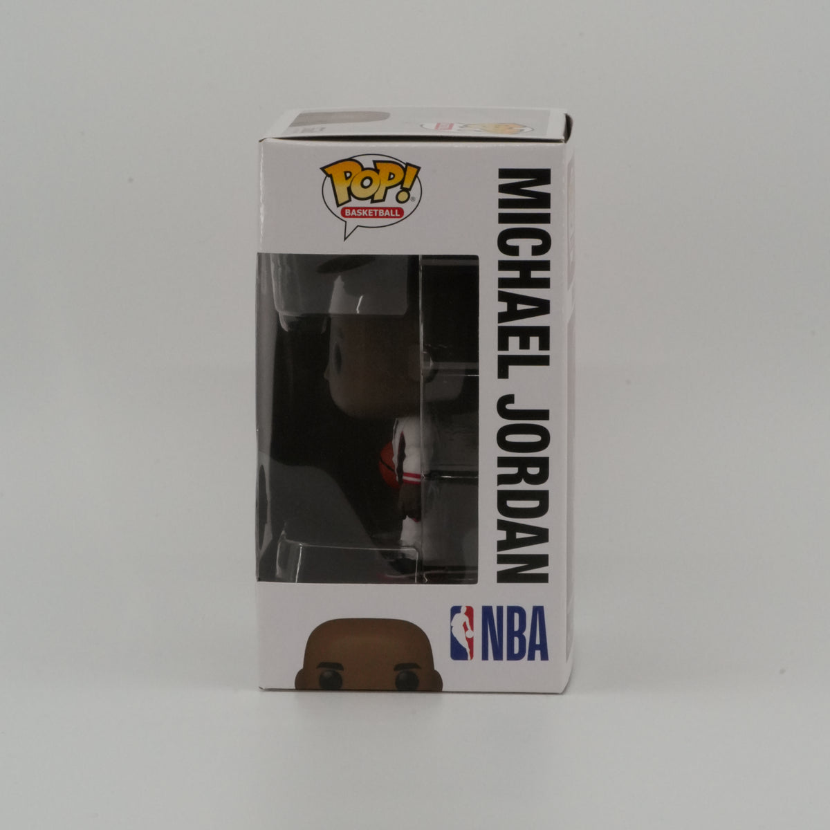 Michael Jordan (White Warm-Up Suit) #84, actual item, window side view